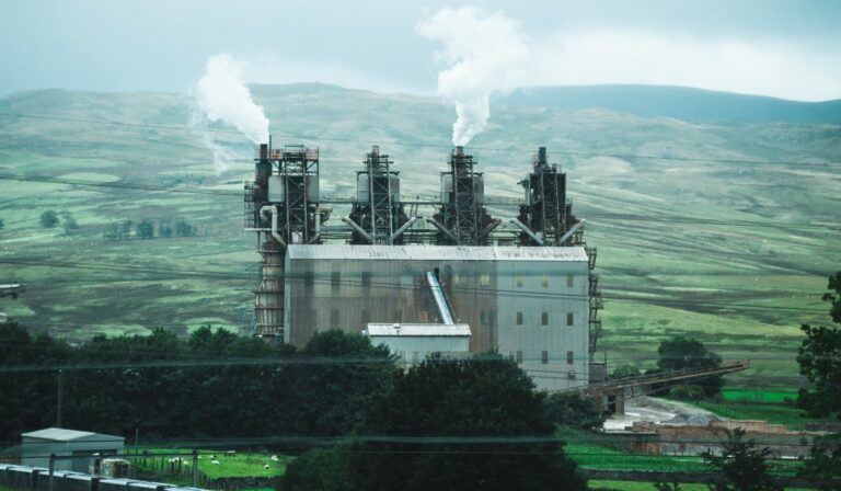 White building causing air pollution in the countryside