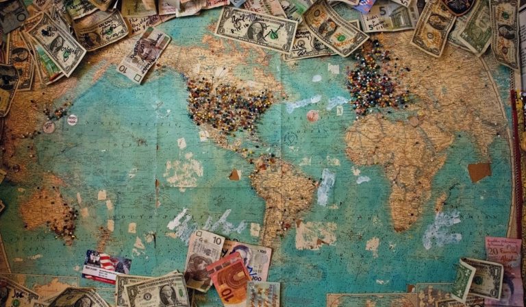 World map with money on it