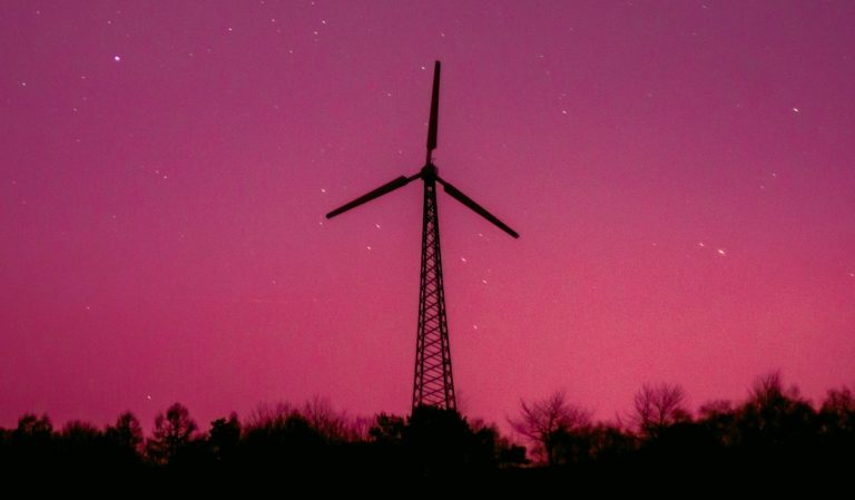 Wind turbine at sunset