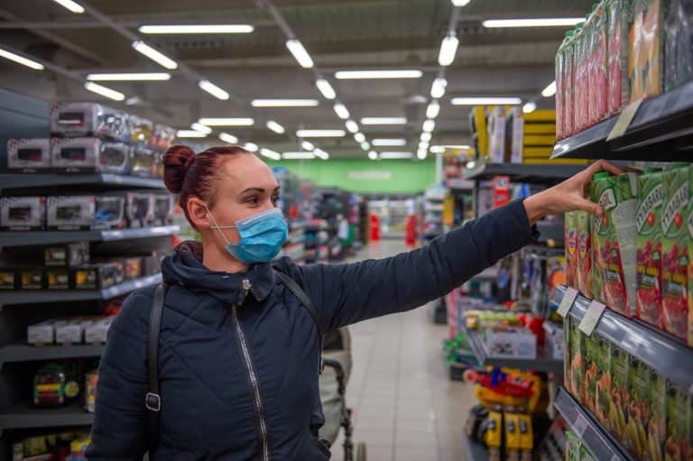 A person picking up a grocery