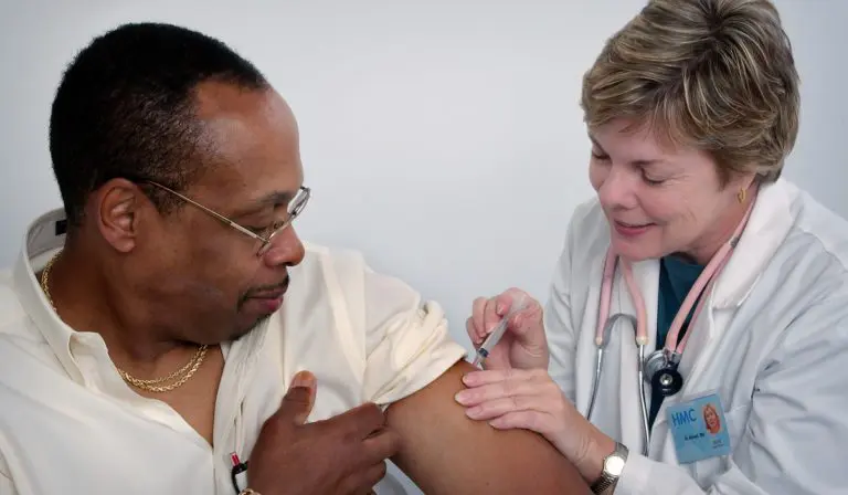 A man receiving flu shot