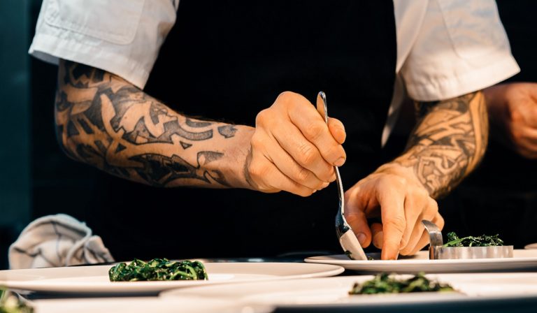 A chef preparing the food