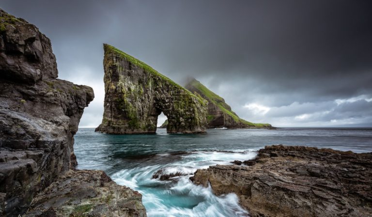 Rock formation in water, Faroe Islands