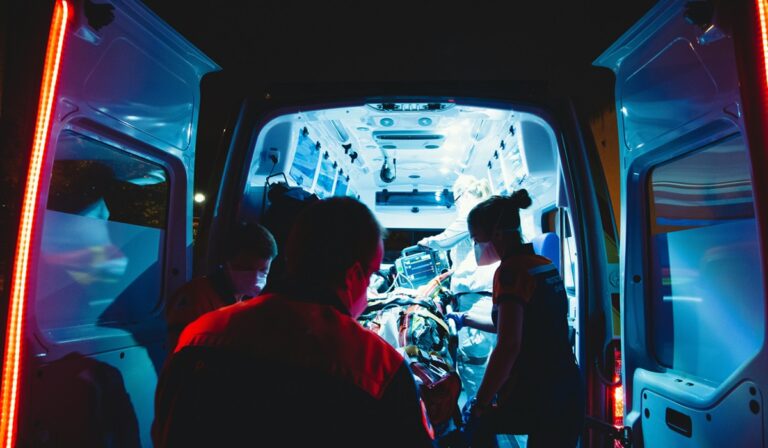 Ambulance and EMT workers at night