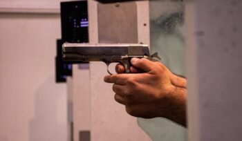 A person holding handgun|Las Vegas