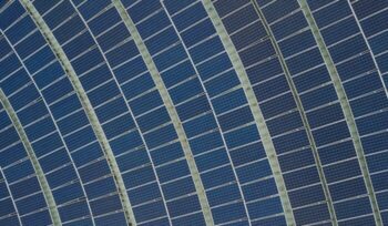 Aerial view of solar panels|Solar panels unsplash