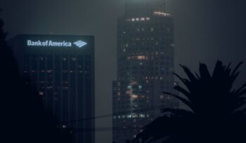 Bank of America logo on building at night|american public power association unsplash