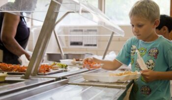 Child getting school lunch