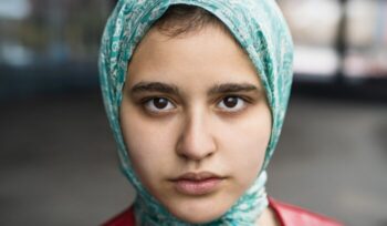 Closeup portrait of muslim girl looking in camera