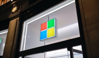 Microsoft logo on storefront|tadas sar T GZhBSyMQ unsplash