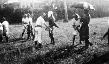 New Zealand sailors removing white band insignia of the Mau 1930