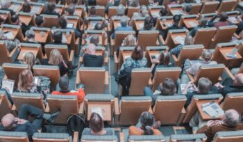 People in auditorium seating