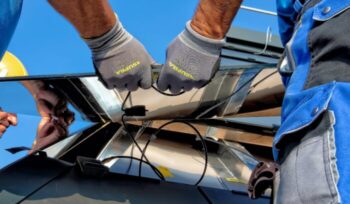 People installing solar panel