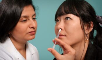 Person receiving nasal spray