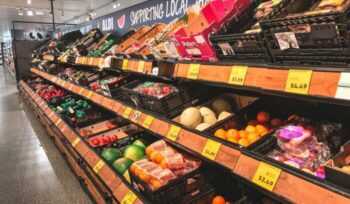 Produce aisle at grocery store|neonbrand unsplash