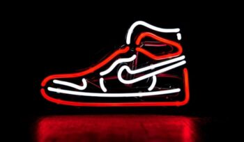 Red and white neon sign of Nike shoe|Nike shoes