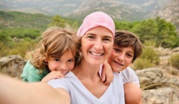 Self-portrait of a woman with cancer and her children|ken treloar unsplash