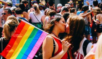 Two women kissing