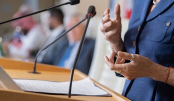 Female politician at podium